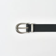 Black belt with silver buckle on a white background